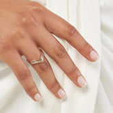 14k Gold Chevron Stackable Ring on woman's finger